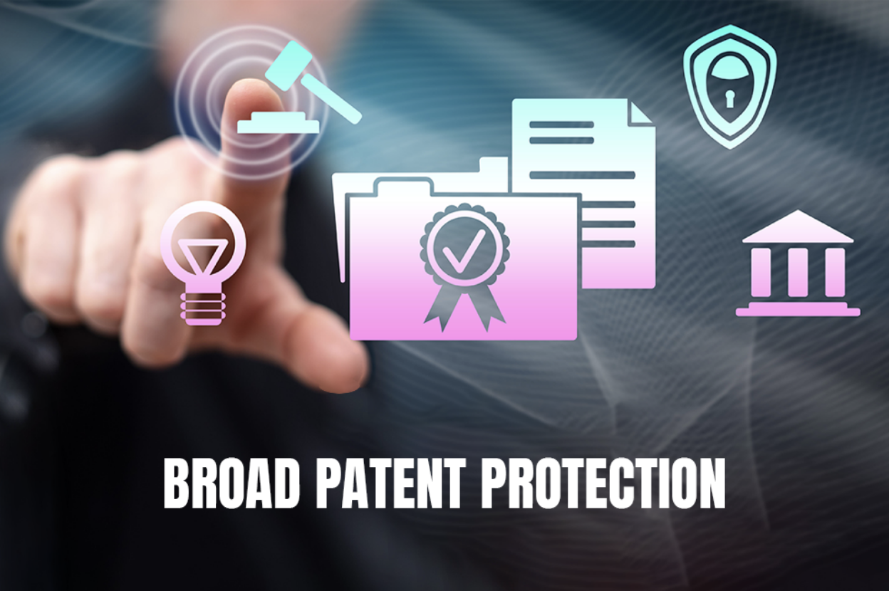 A hand pointing to a concept of broad patent protection for designs and inventions